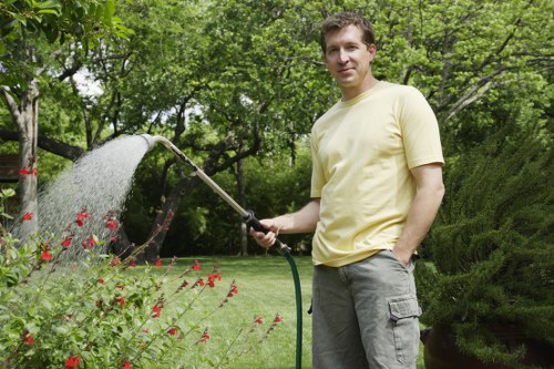 Sustainable landscaping features including native plants and rainwater harvesting